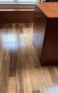 Wood floor installation showcasing elegant and durable design.