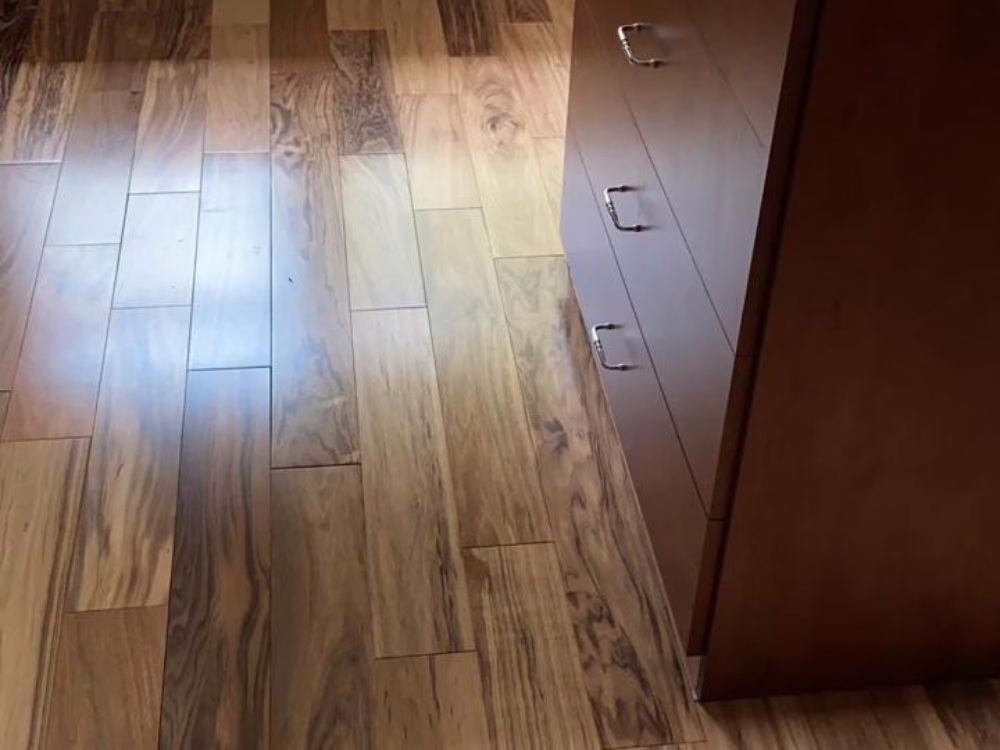 Wood floor installation showcasing elegant and durable design.