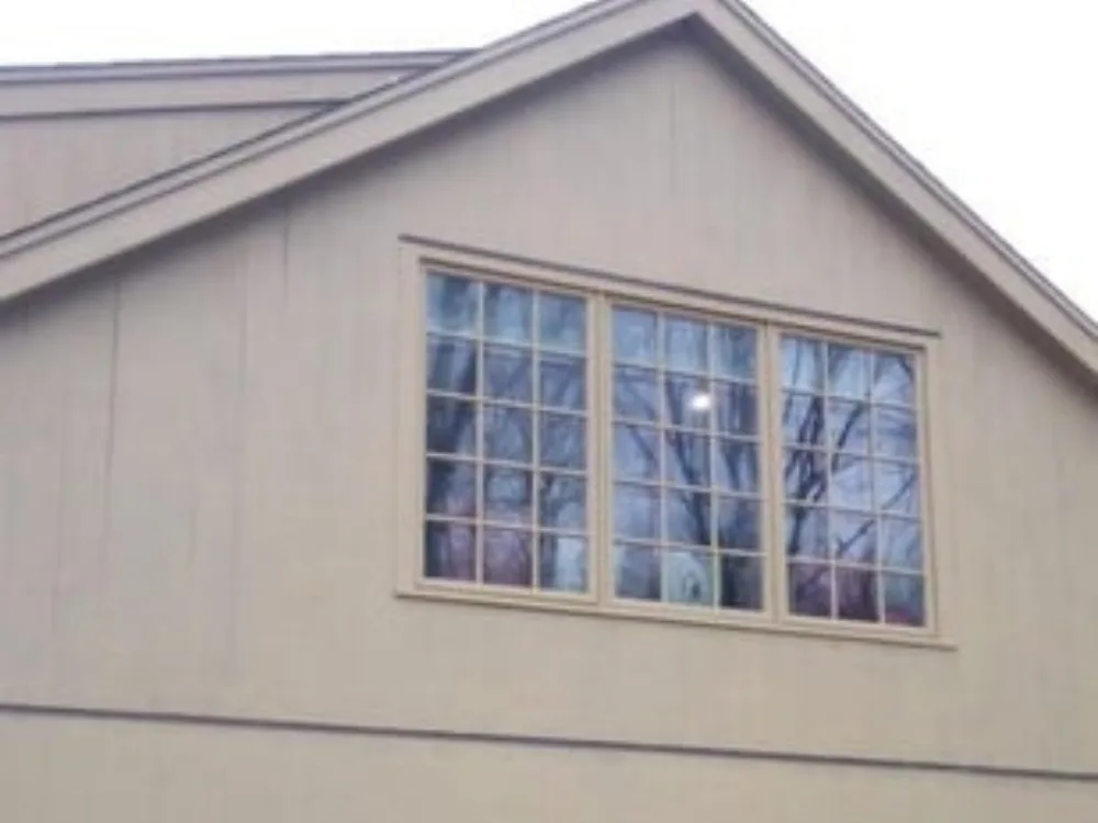 Exterior Painting showing completed garage façade with clean and uniform finish